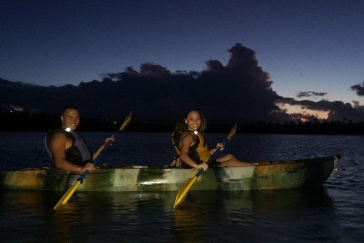 a man in a boat on a body of water